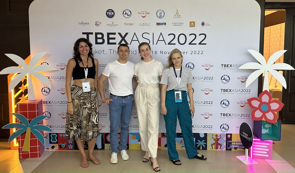 Travelpayouts at the TBEX Asia 2022 conference Travelpayouts team near the TBEX Asia 2022 banner