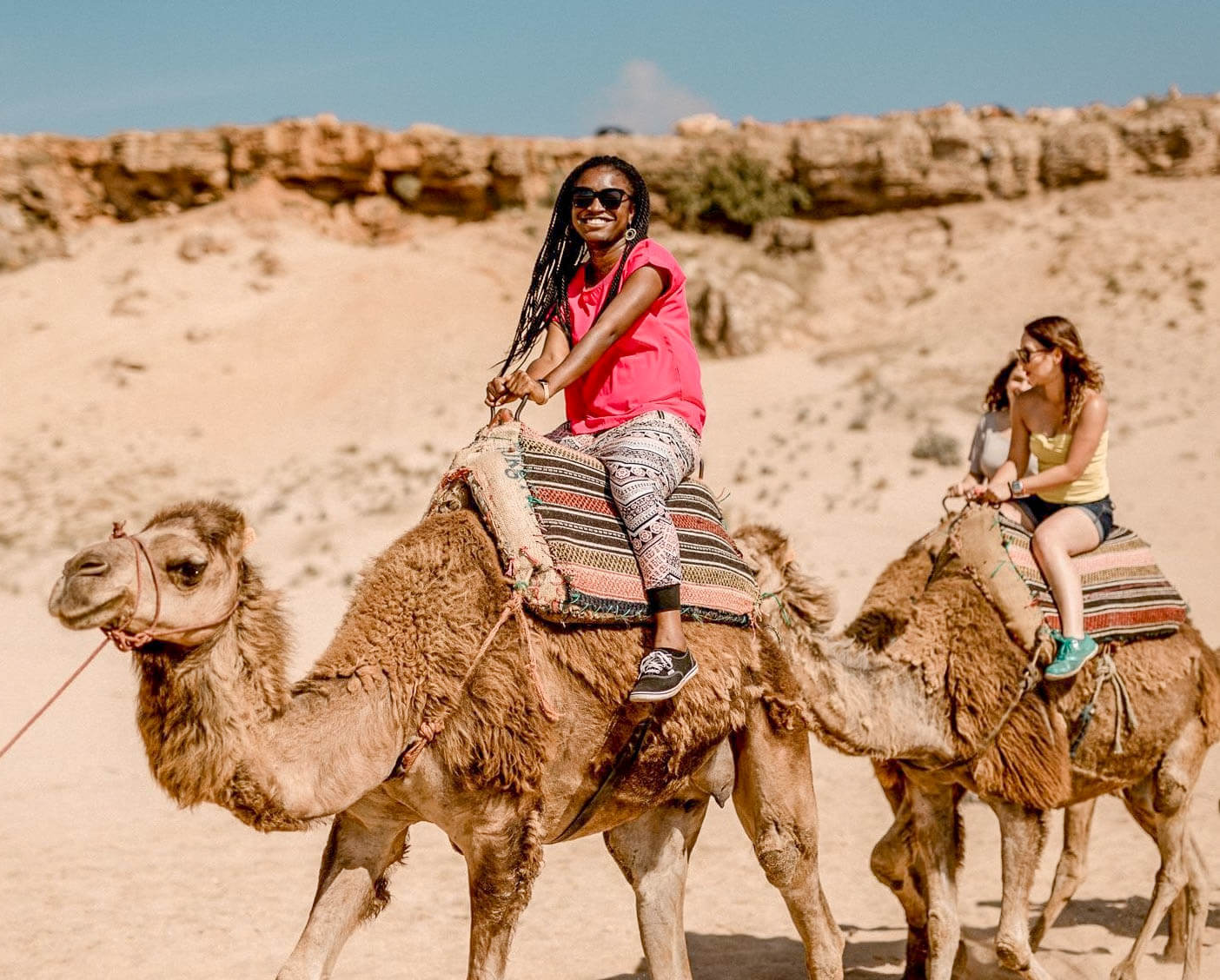 Somto camel riding in Morocco Photo of Somto, author of the blog Somto Seeks camel riding in Morocco